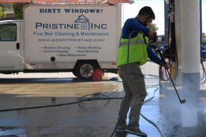 COMMERICAL CLEANING | WASHING CONCRETE PAD AT GAS STATION